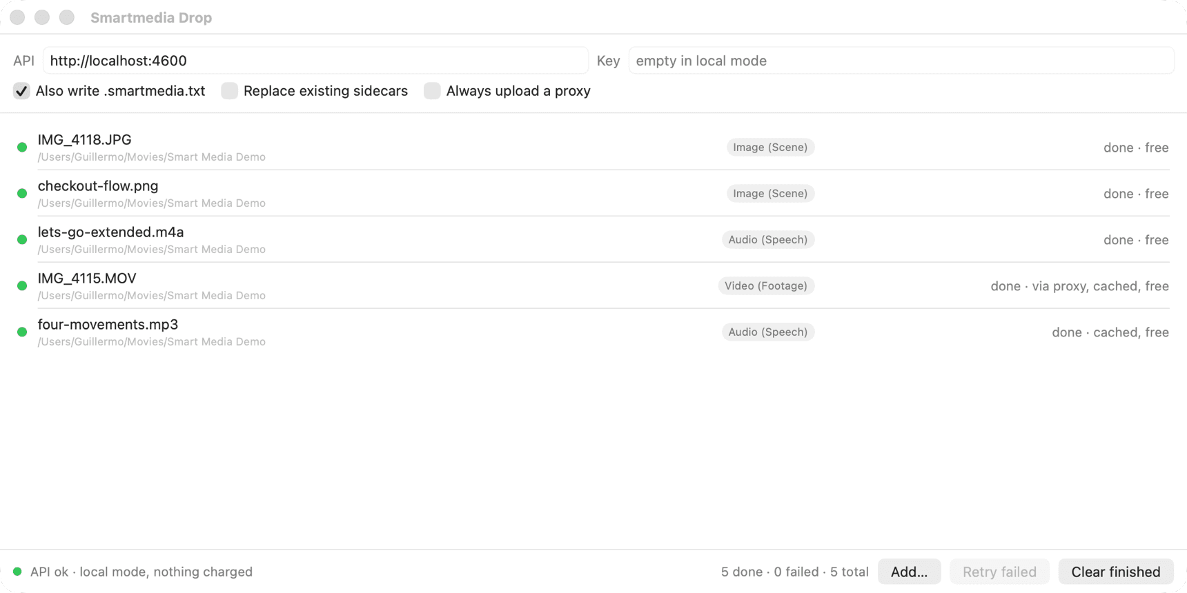 The Smartmedia Drop window with five files done, each tagged with its sidecar type